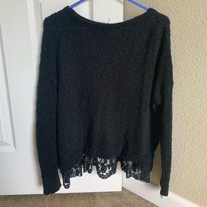 Black loose knit sweater with lace detail